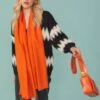 JAYLEY Cashmere Blend Wrap In Orange With Fringed Hem And Logo